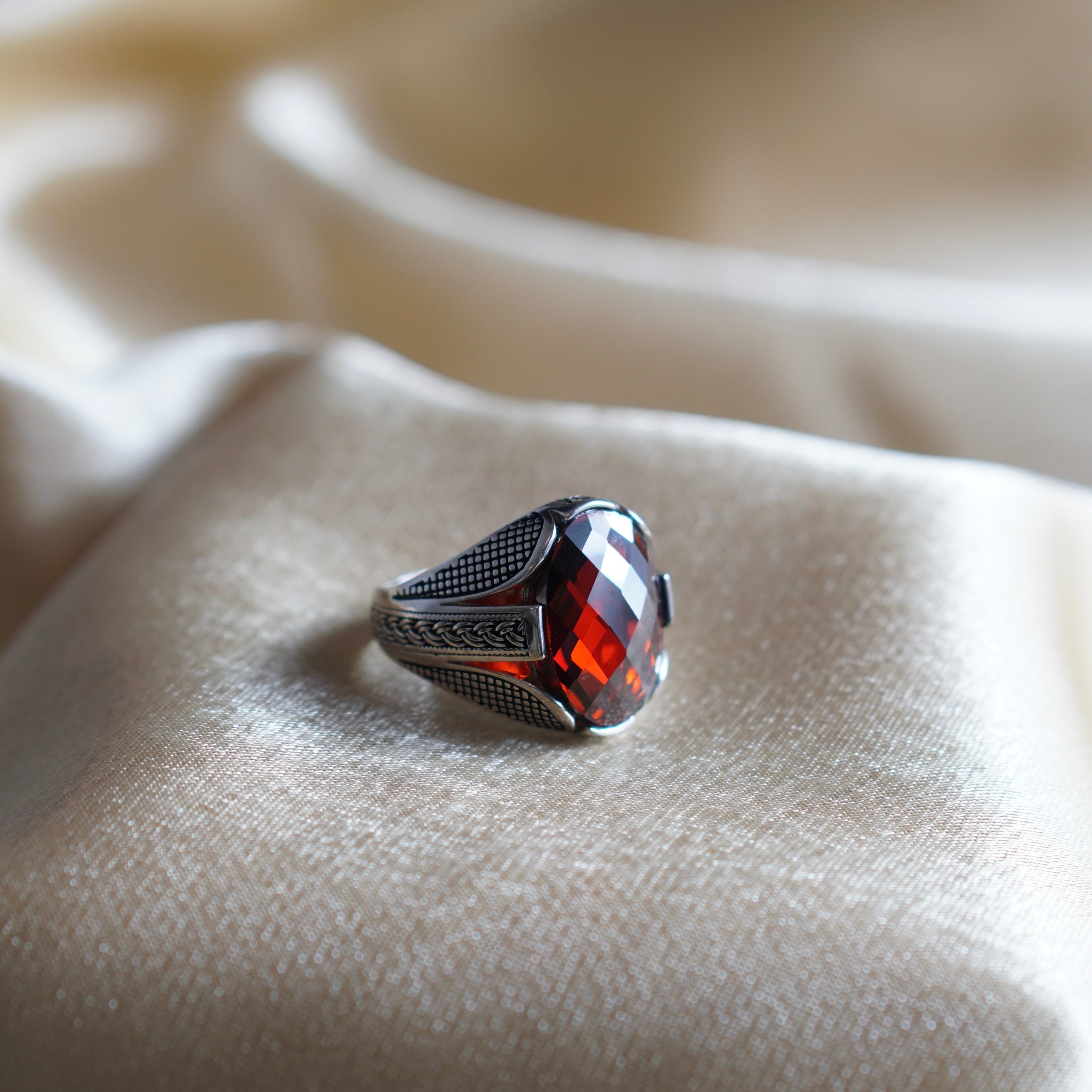 Red clearance zircon ring